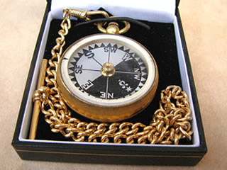 Late 19th century pocket compass with mother of pearl dial, shown in modern gift box